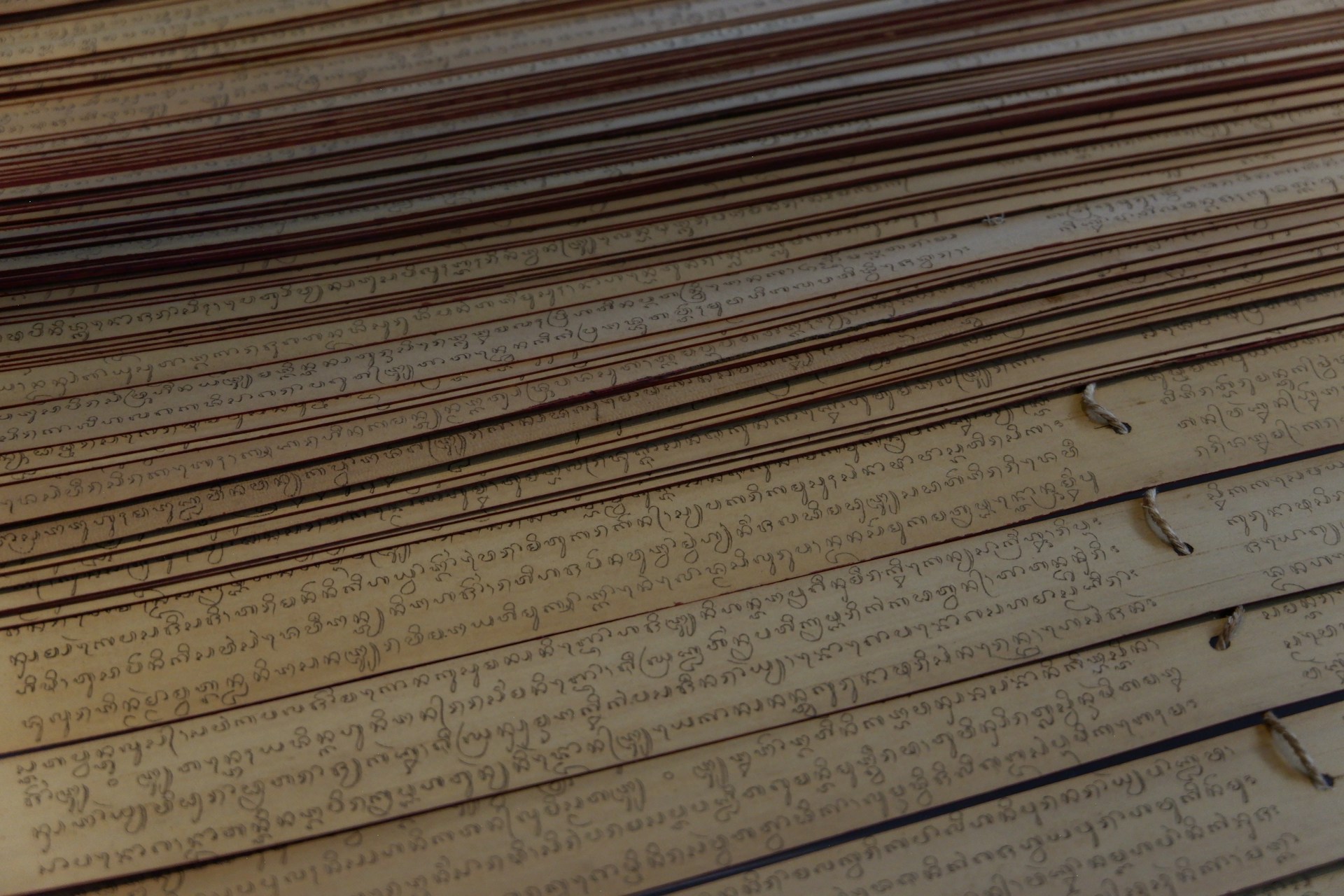 A stack of old books with a blurry background