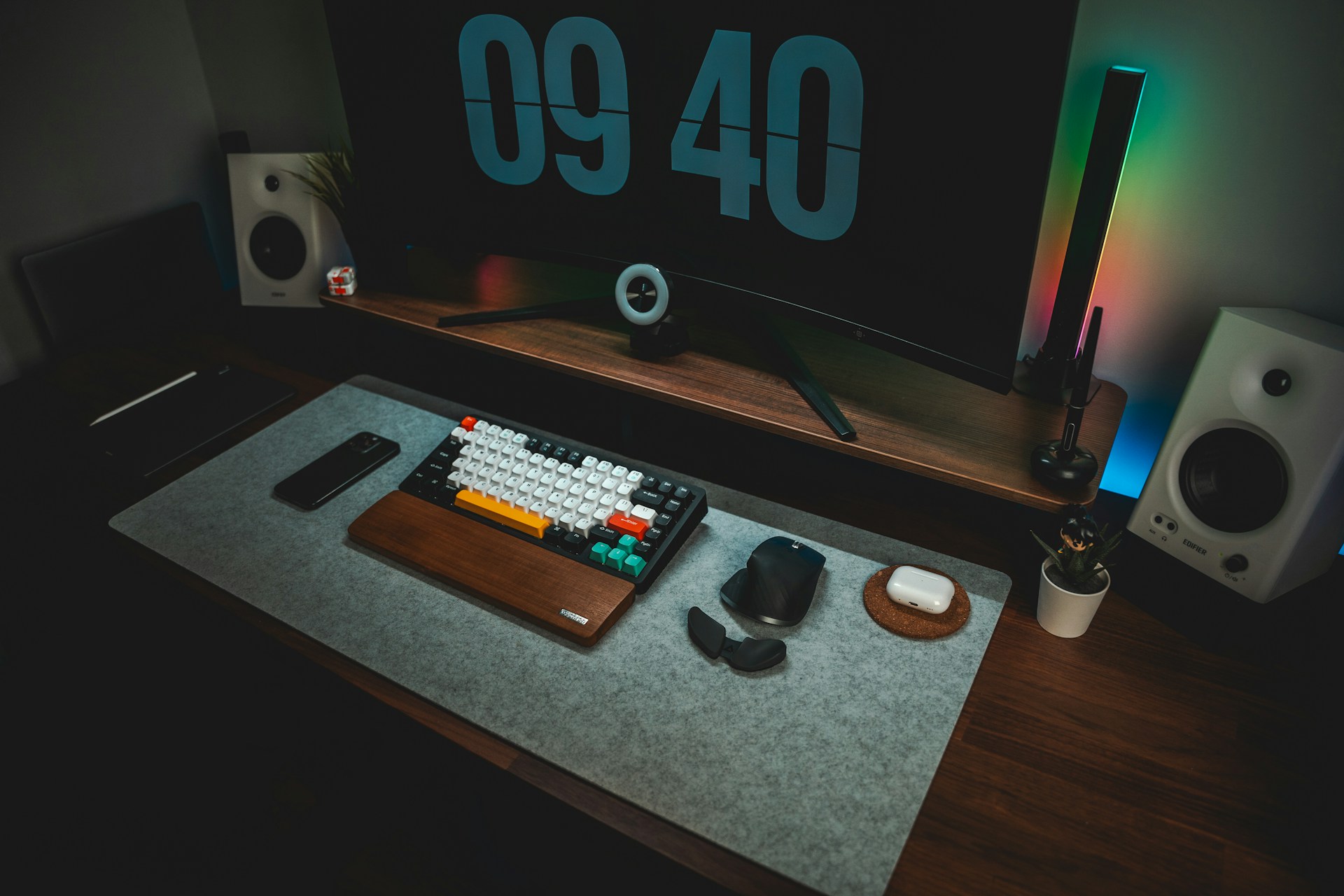 A computer monitor sitting on top of a wooden desk