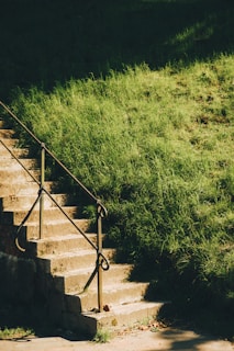 A man riding a skateboard down a set of stairs