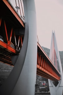 A large bridge with a train going over it