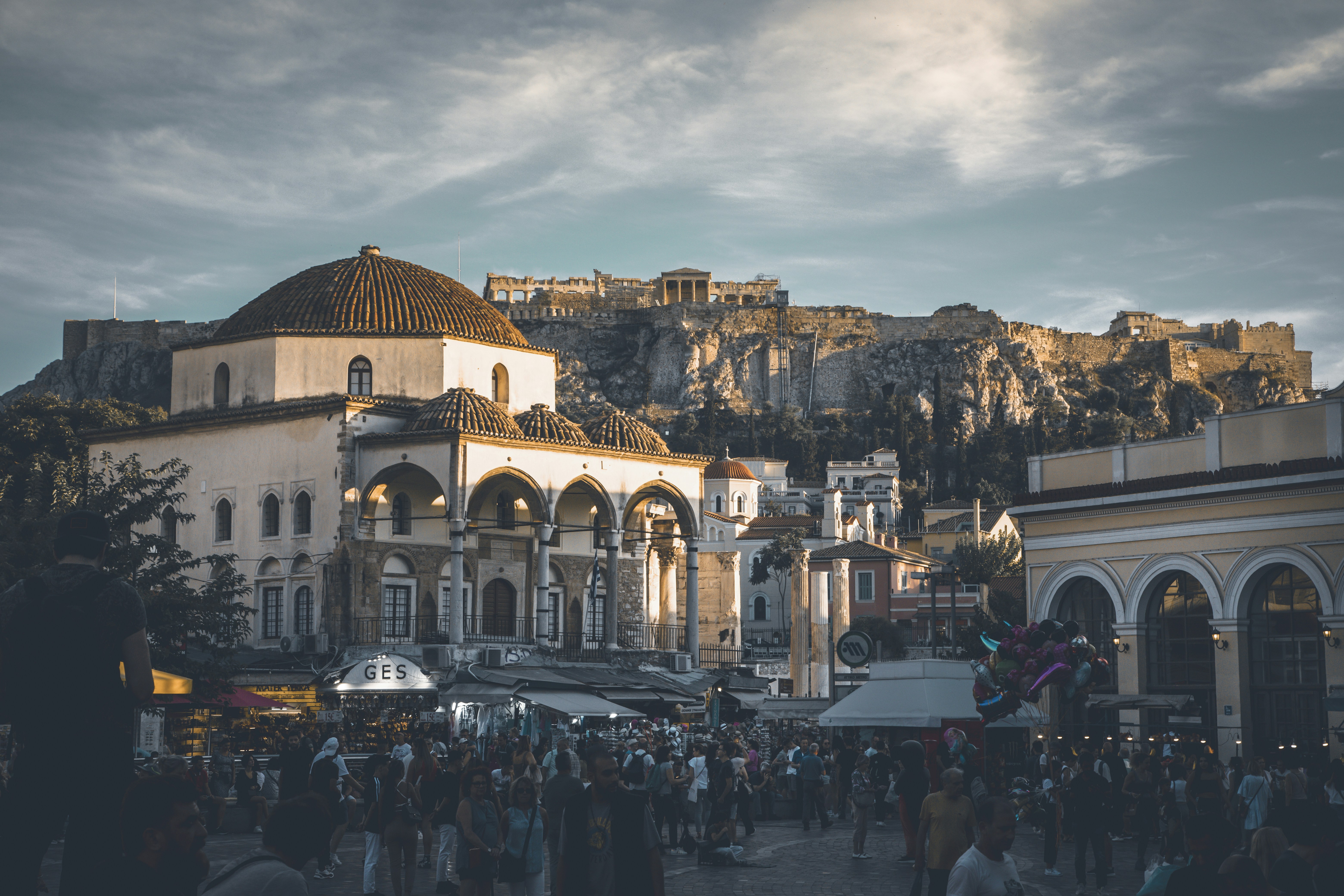 A group of people standing in front of a building