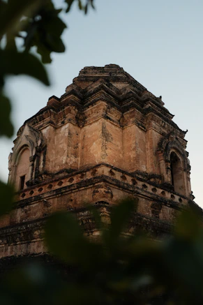 A tall tower with a clock on top of it
