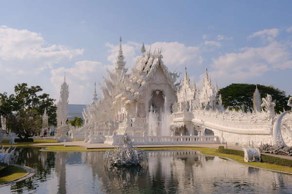 A large white building with a fountain in front of it — Chiang Rai, Thailand