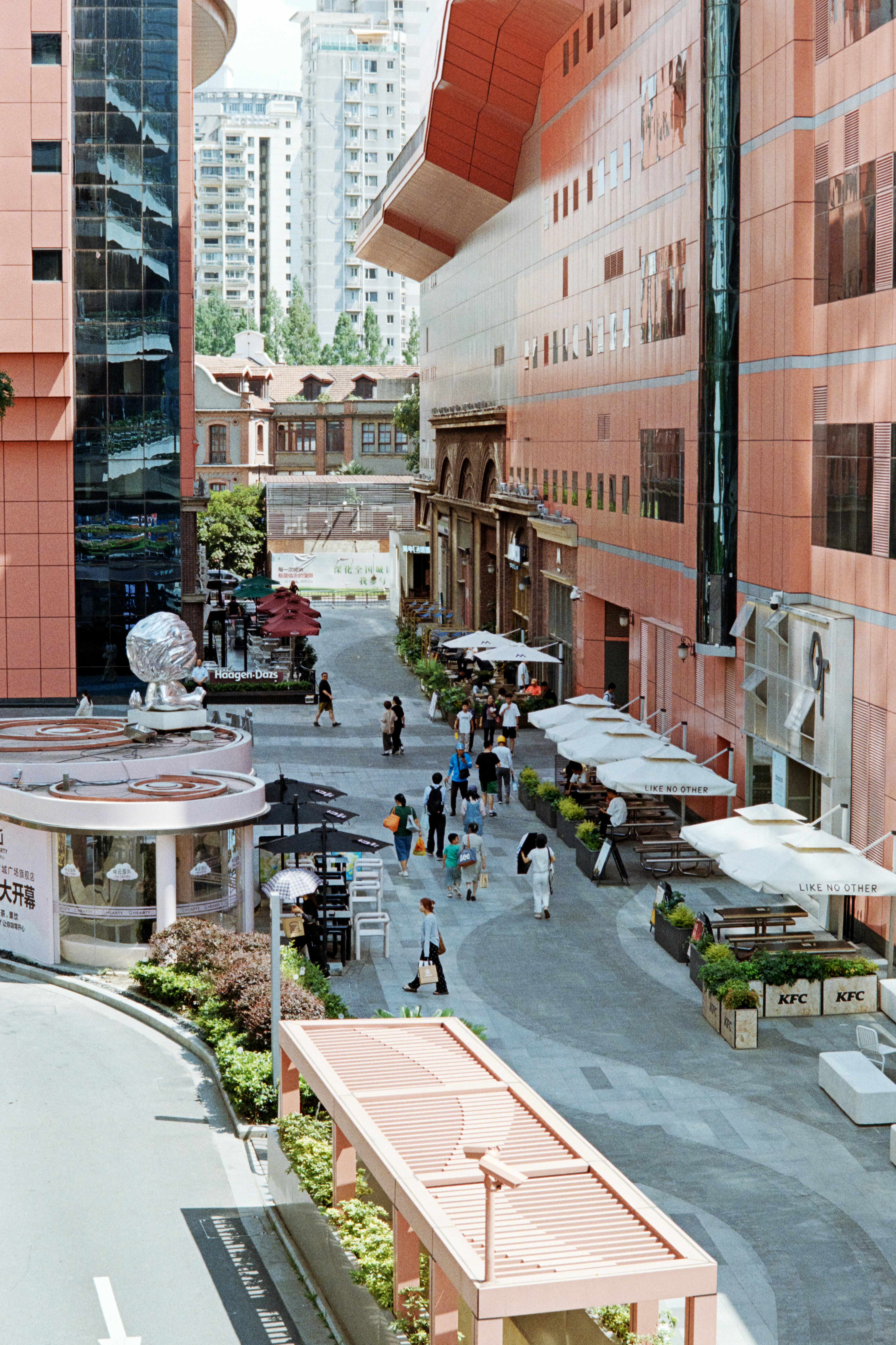 A city street filled with lots of tall buildings