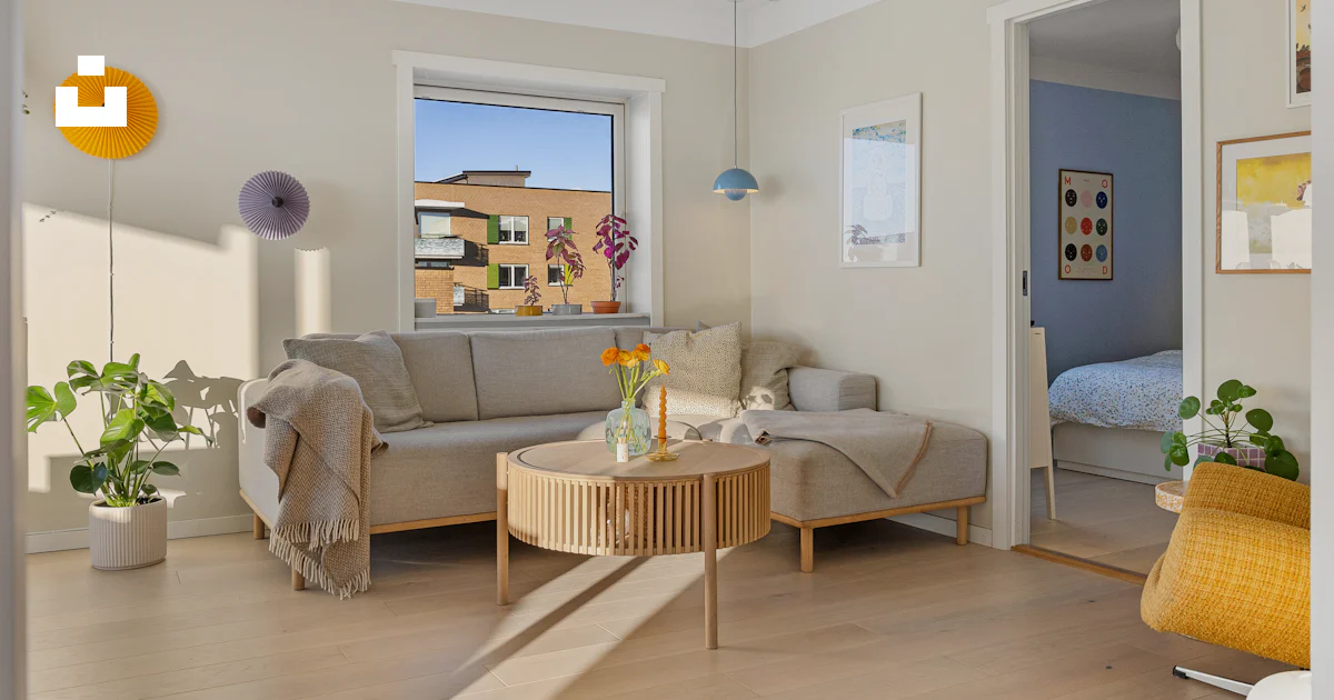 A living room filled with furniture and a window photo – Free Corner ...