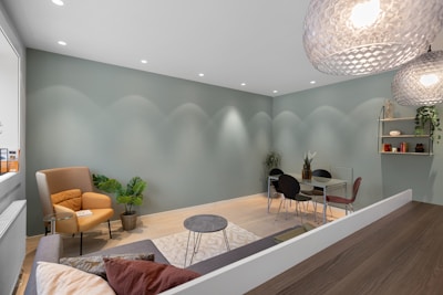 A living room filled with furniture and lots of windows