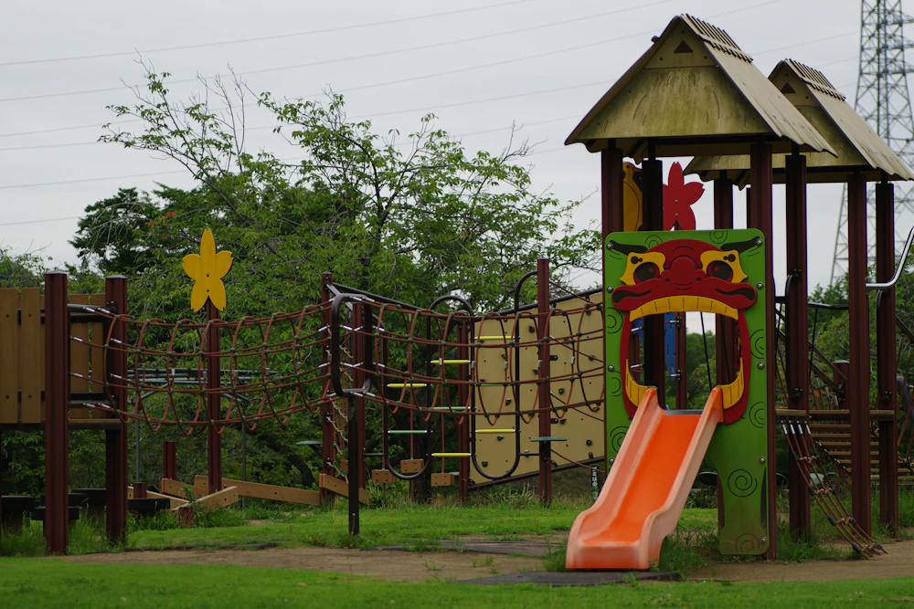 Children’s outdoor play area with slide and climbing frame
