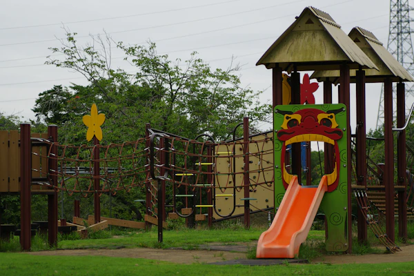 Children’s outdoor play area with slide and climbing frame