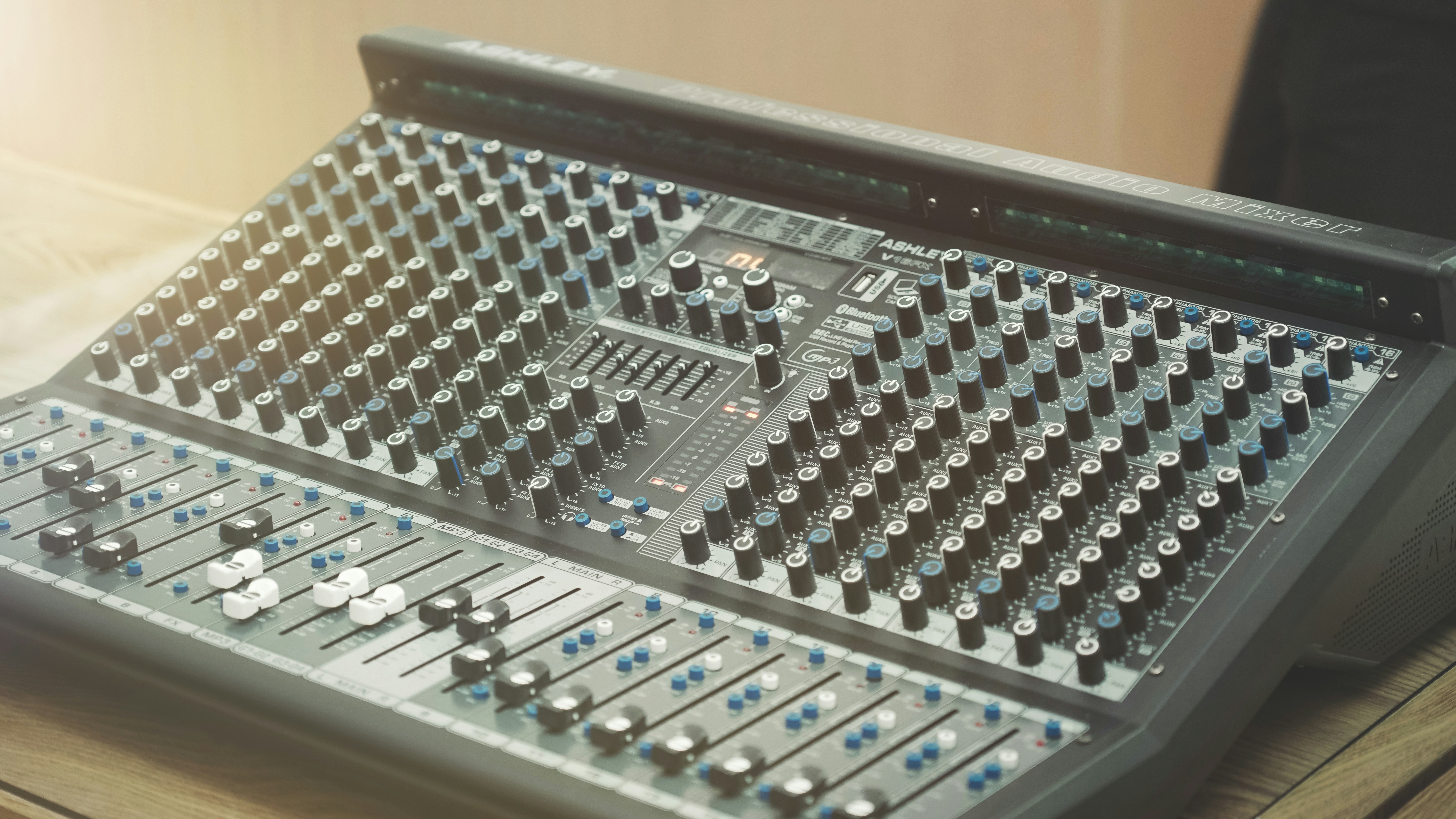A sound board sitting on top of a wooden table