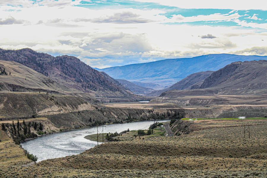 River running through a grassland valley