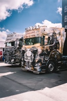 A group of trucks parked next to each other