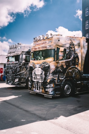 A group of trucks parked next to each other