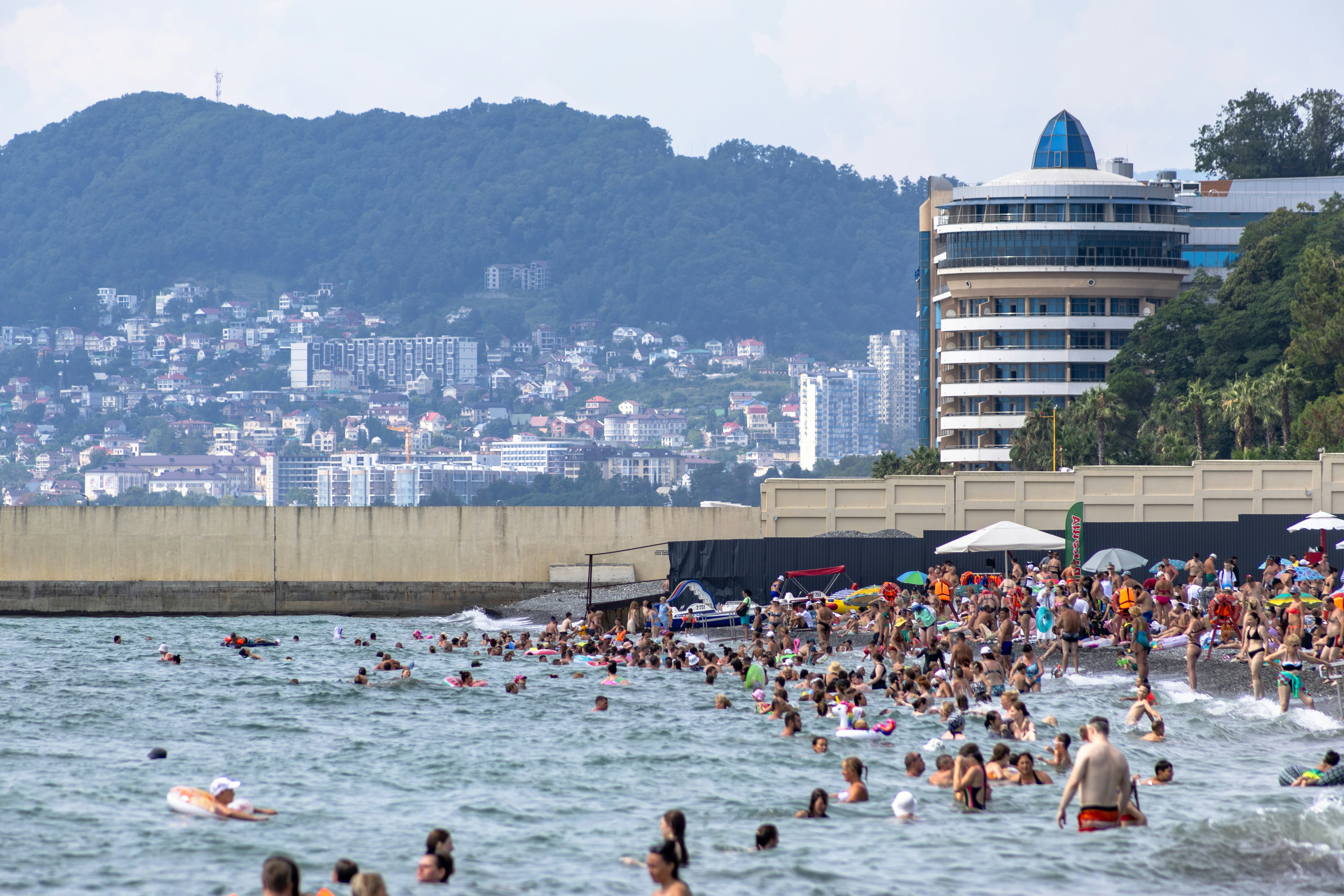 A large group of people swimming in the ocean