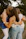 A group of young women hugging each other