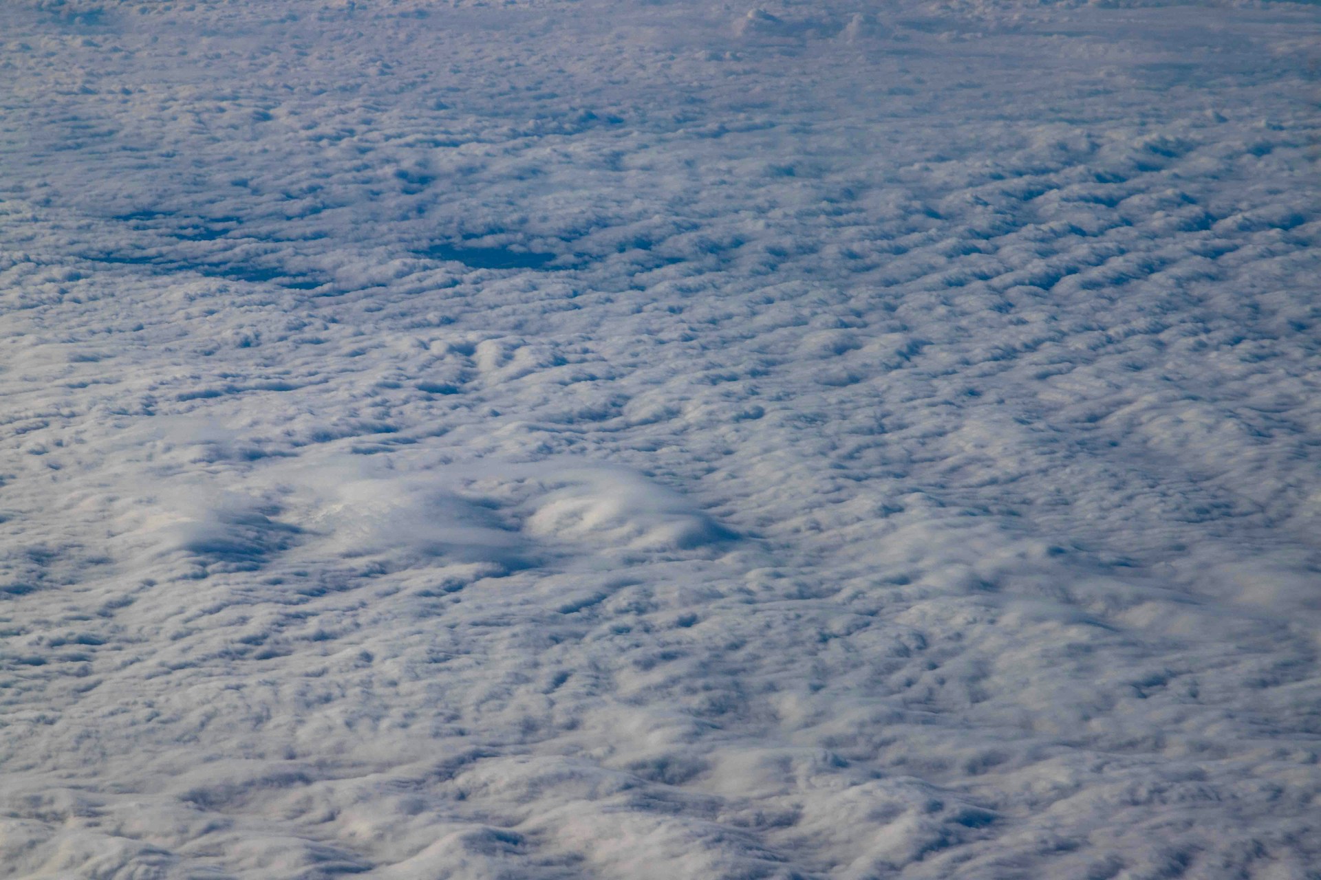 A view of the clouds from an airplane window