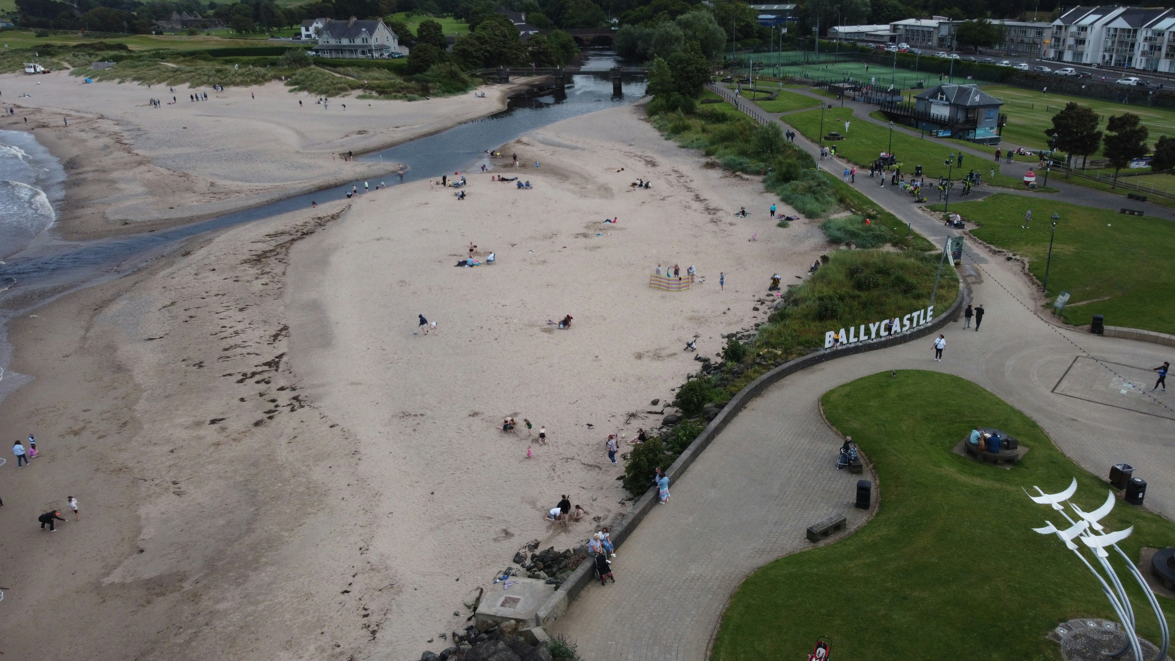 A bird's eye view of a beach and a body of water