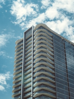 A tall building with a sky background
