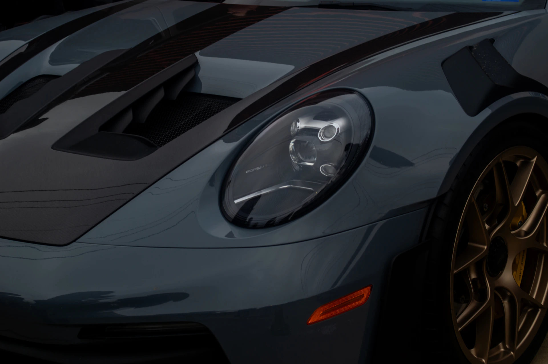 A close up of the front of a sports car