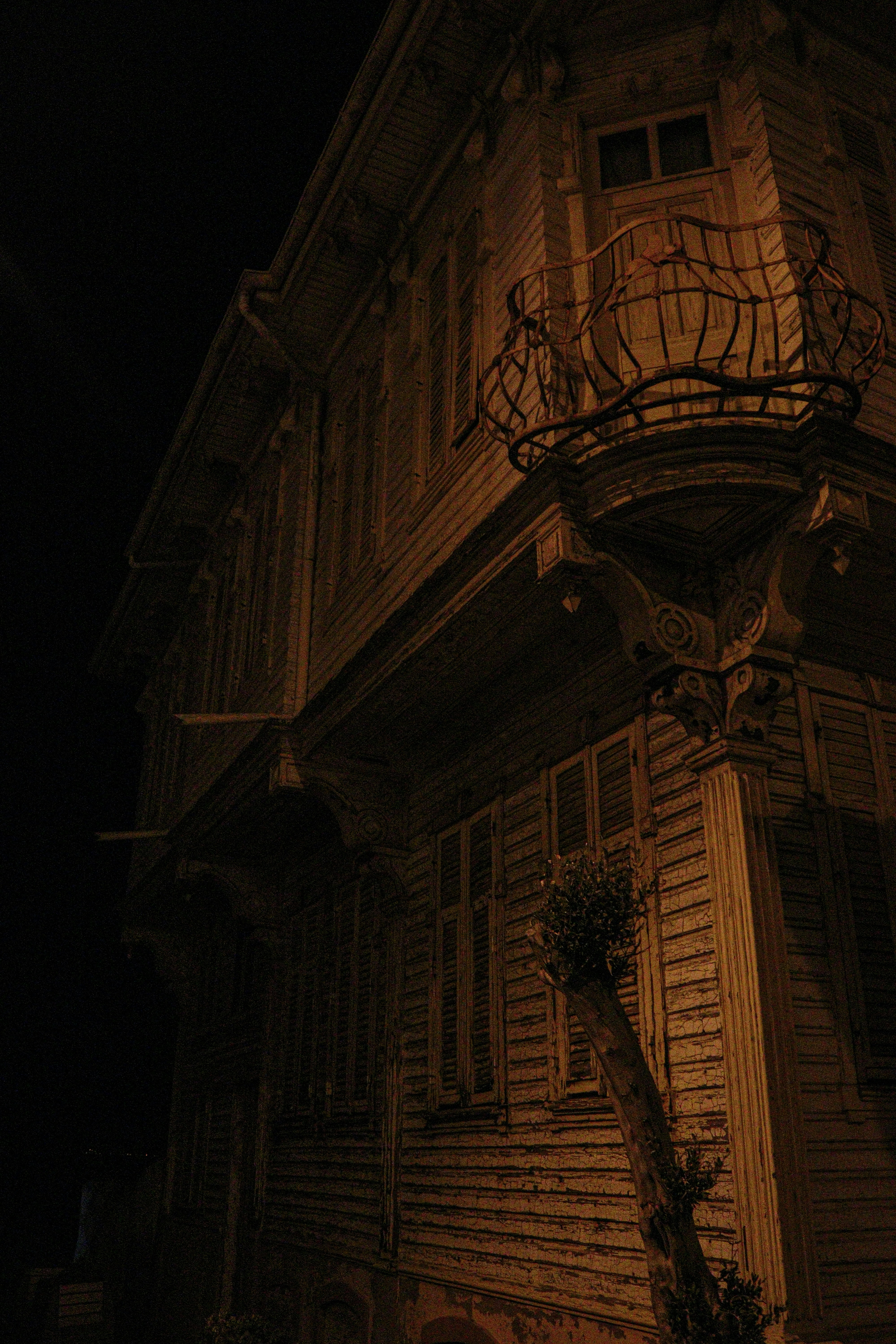 An old building with a clock on the side of it