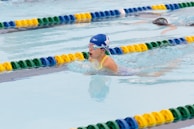 A group of people swimming in a pool
