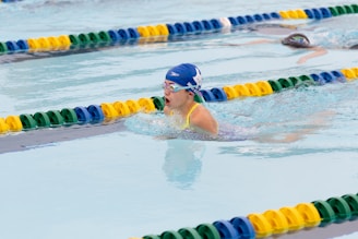 A group of people swimming in a pool