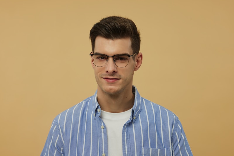 Stylish gay man with glasses