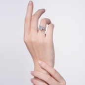 A woman's hand with a ring on it