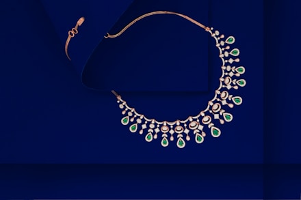 A diamond necklace and a pair of earrings