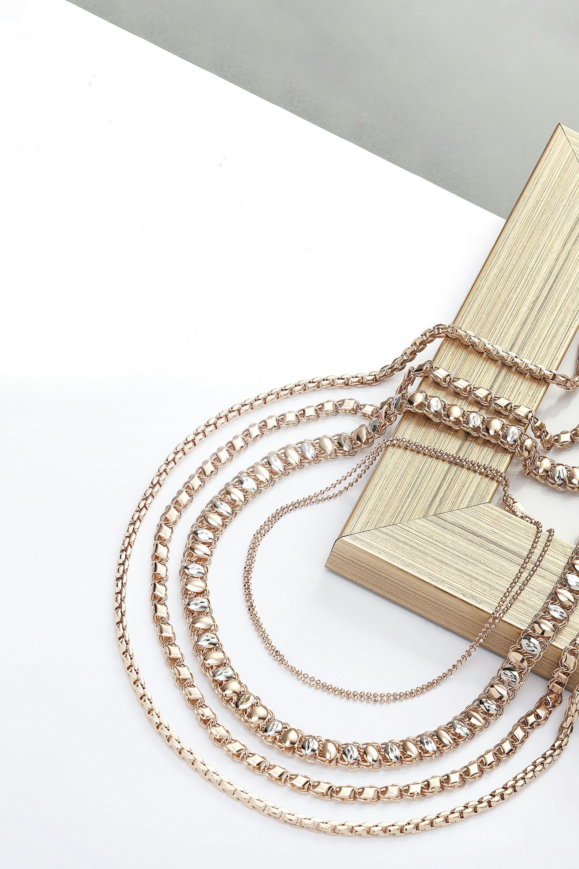 A wooden box with a chain attached to it