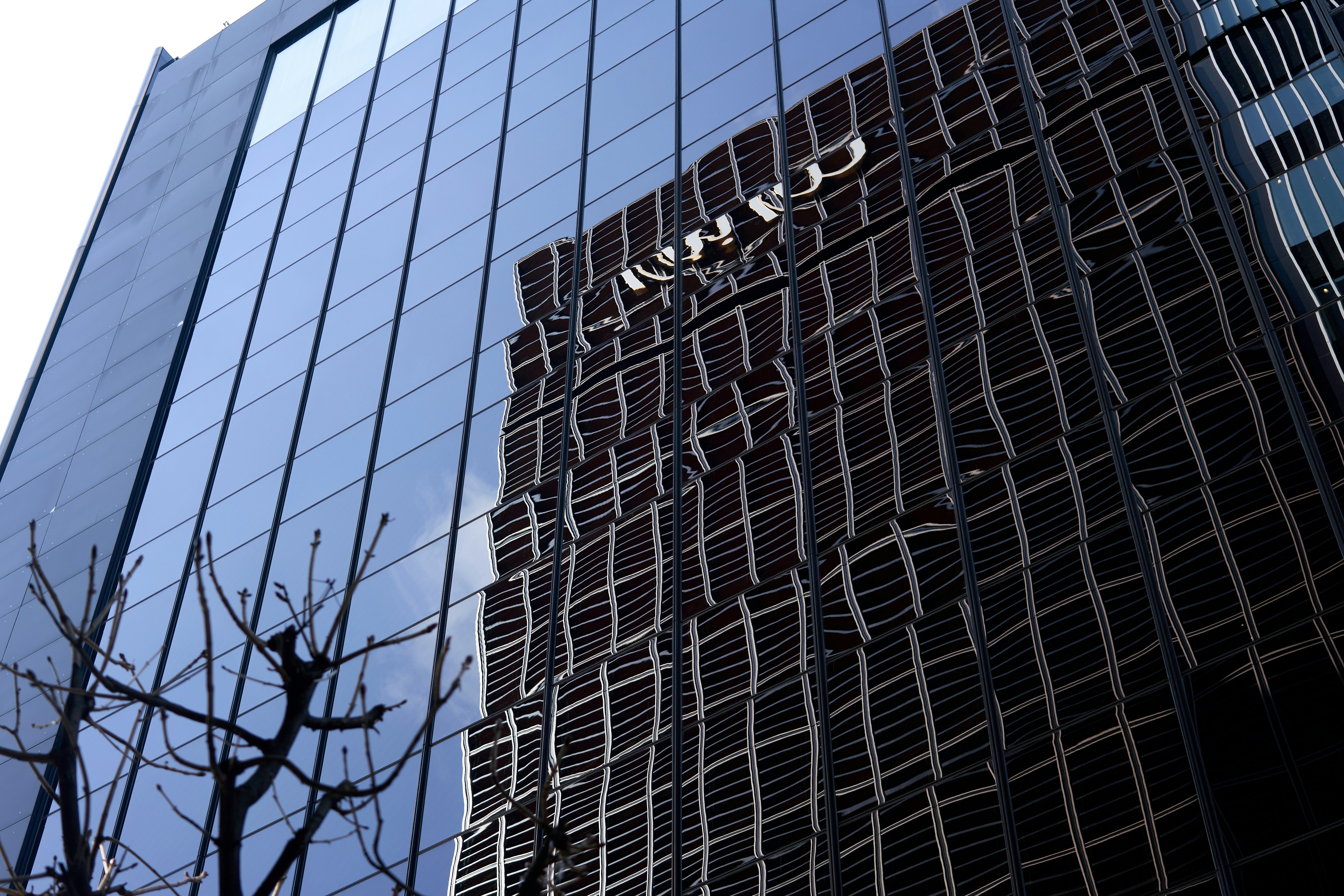 A very tall building next to a very tall building