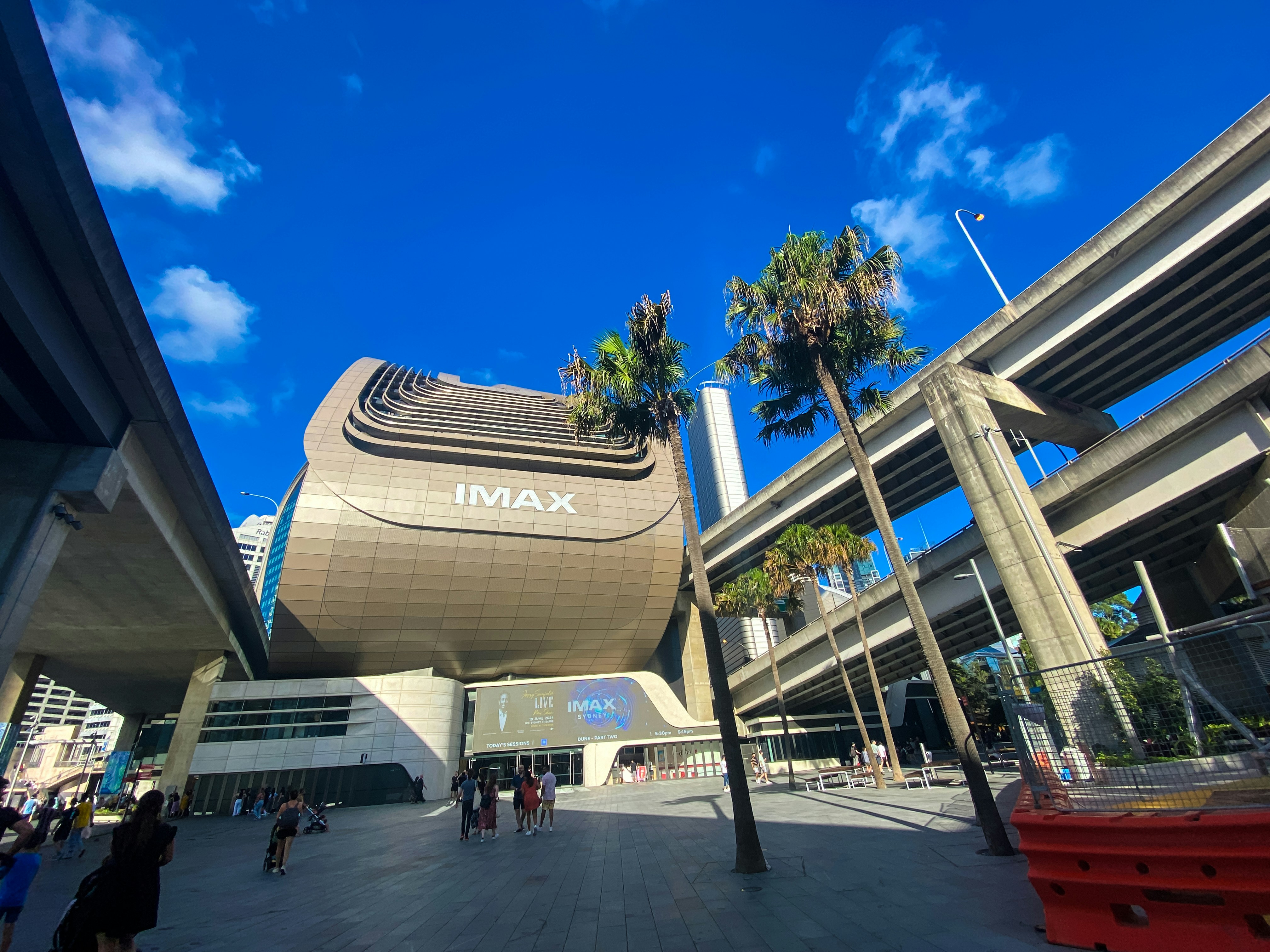 A large building with a giant boat on top of it
