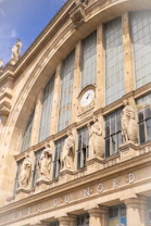 A large building with a clock on the side of it