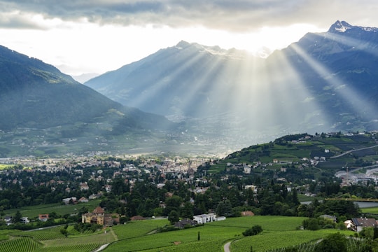 A view of a valley with mountains in the background