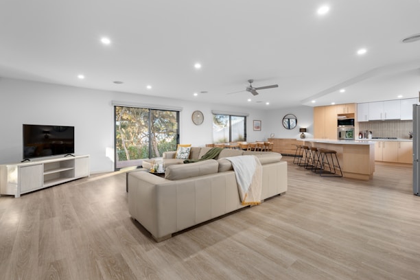 A living room filled with furniture and a flat screen TV