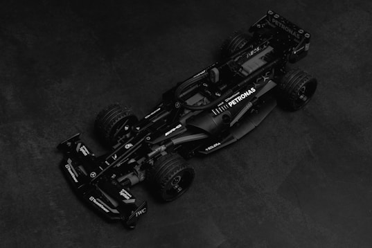 A black and white photo of a racing car