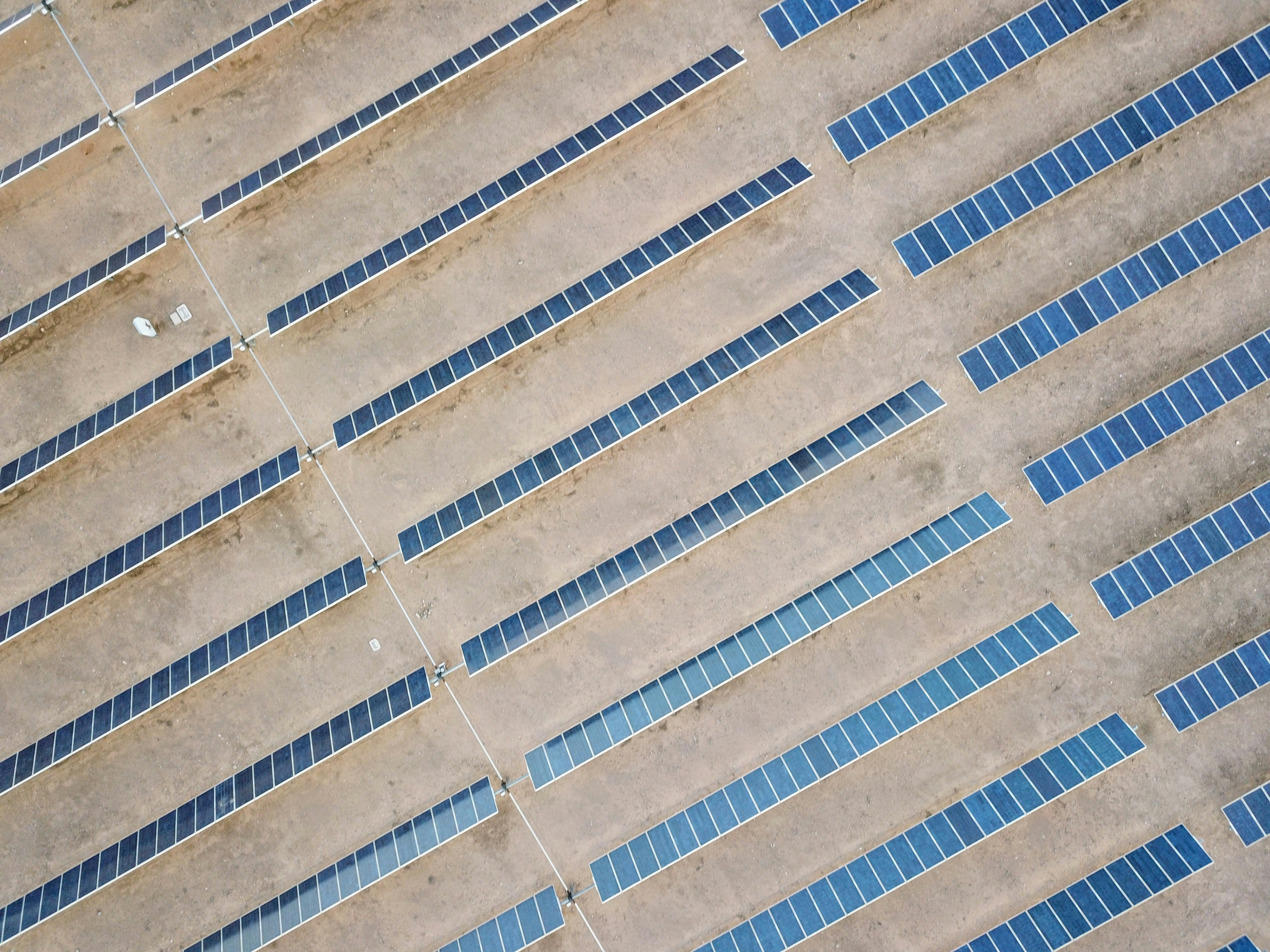 A red stop sign sitting on the side of a building