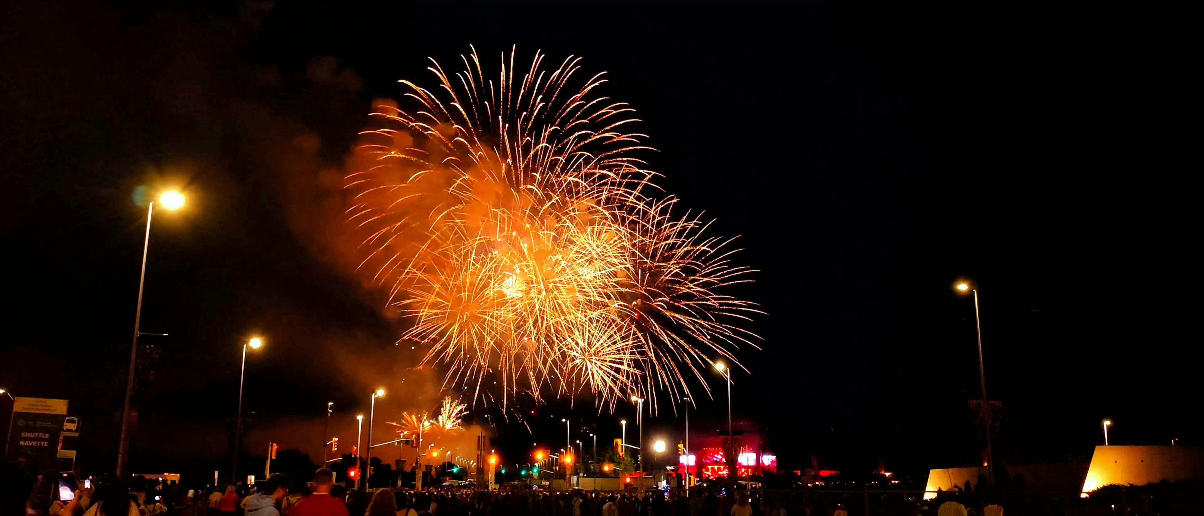 A large fireworks display in the night sky, 