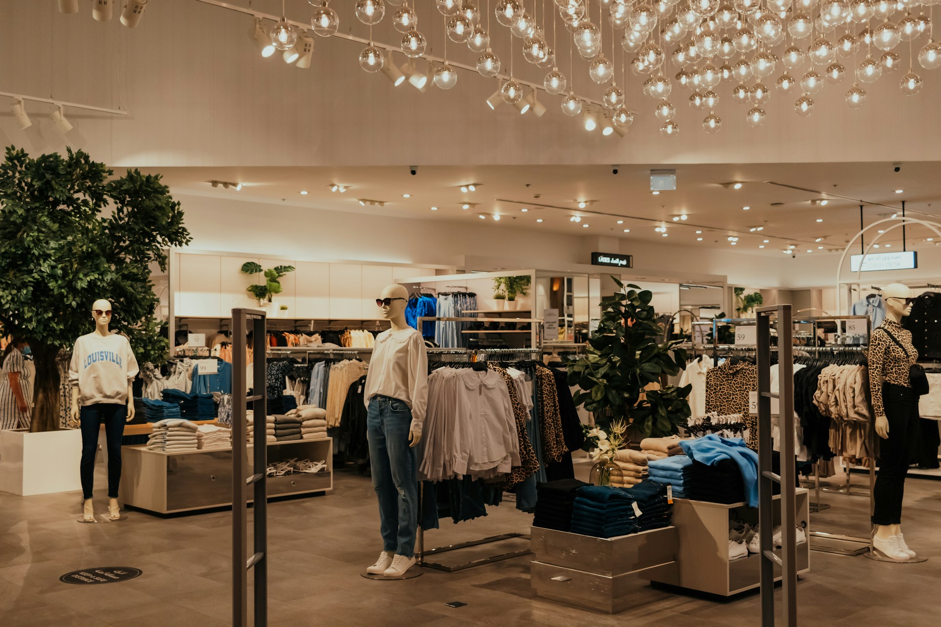 A store filled with lots of clothes and furniture