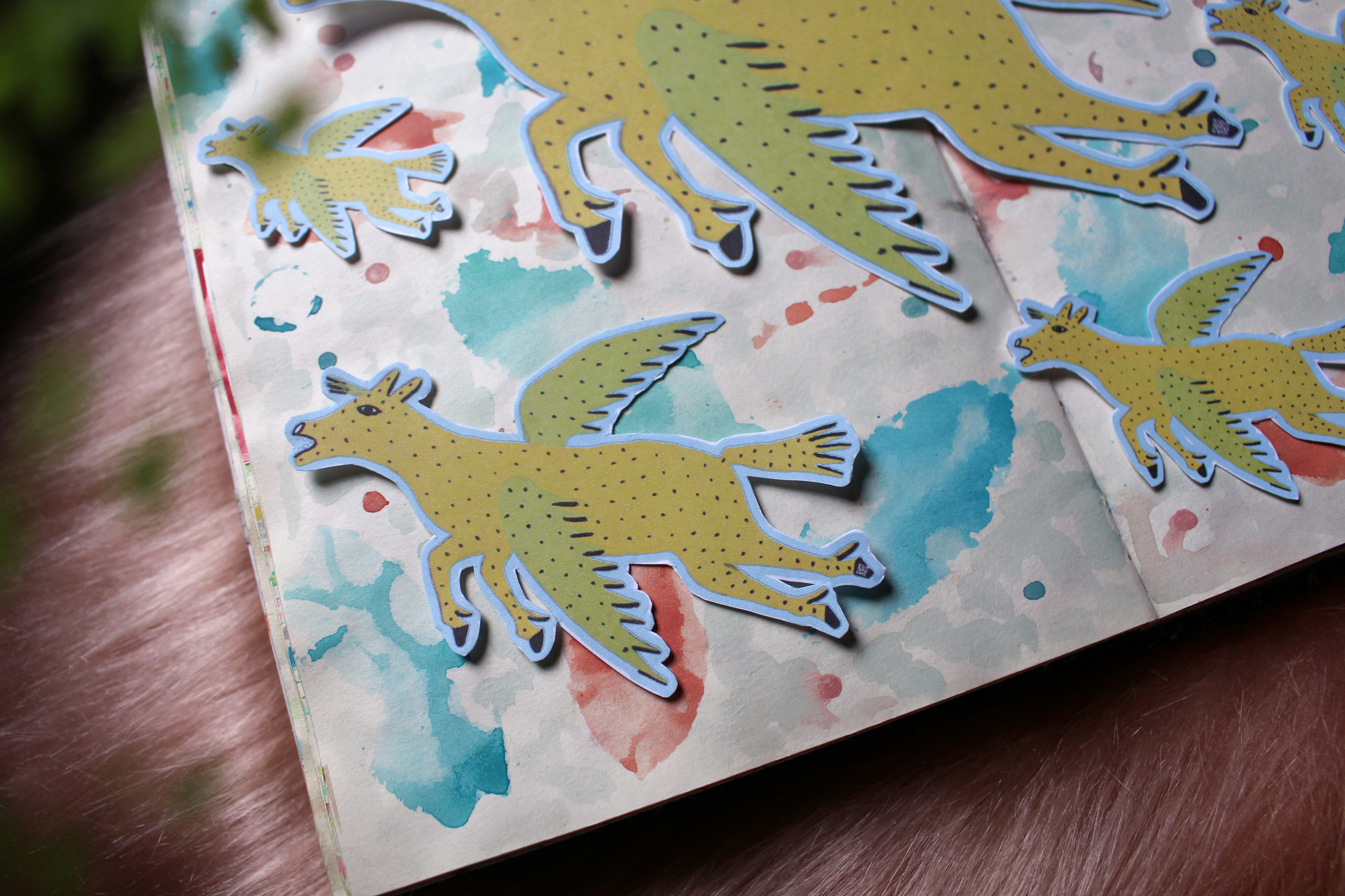 A close up of a piece of paper with birds on it