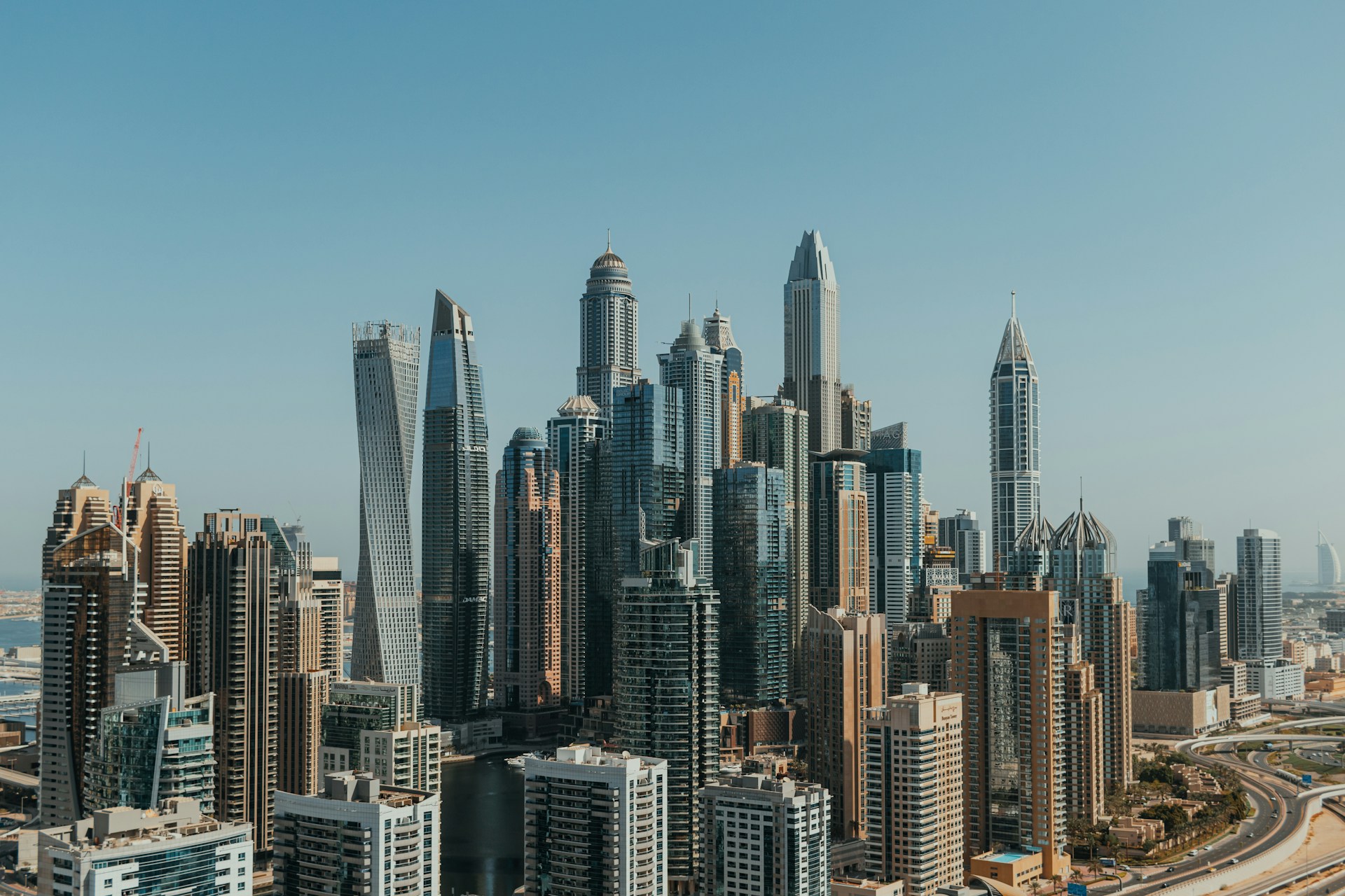 An aerial view of a city with tall buildings