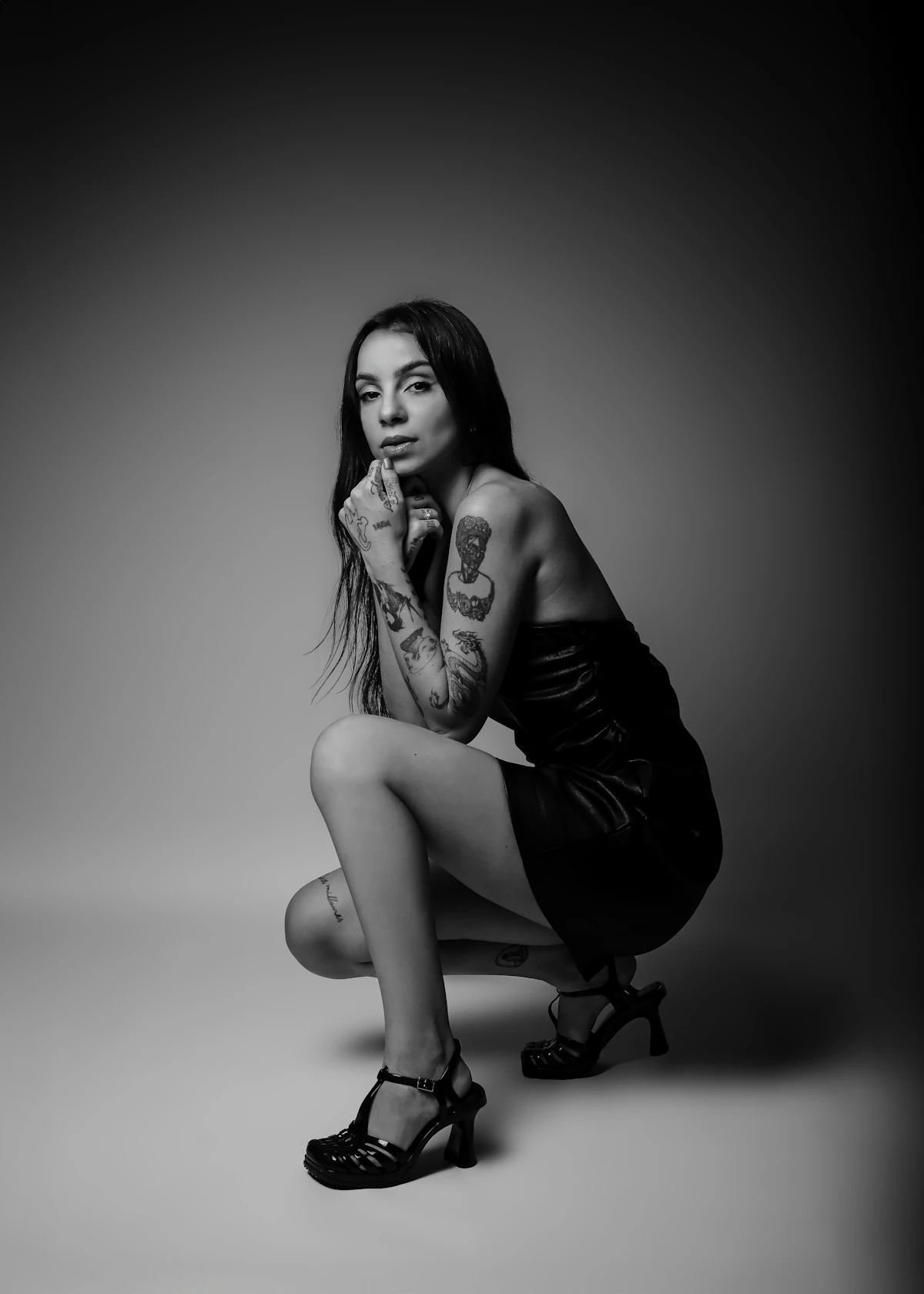 Sloane — studio portrait in black and white, fine-line specialist