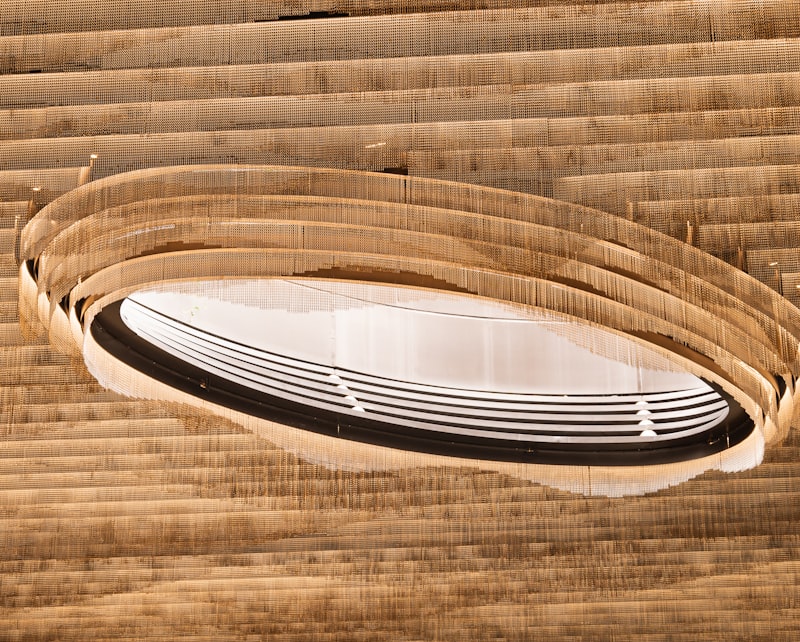 Close view of a wall-mounted air vent with warm light