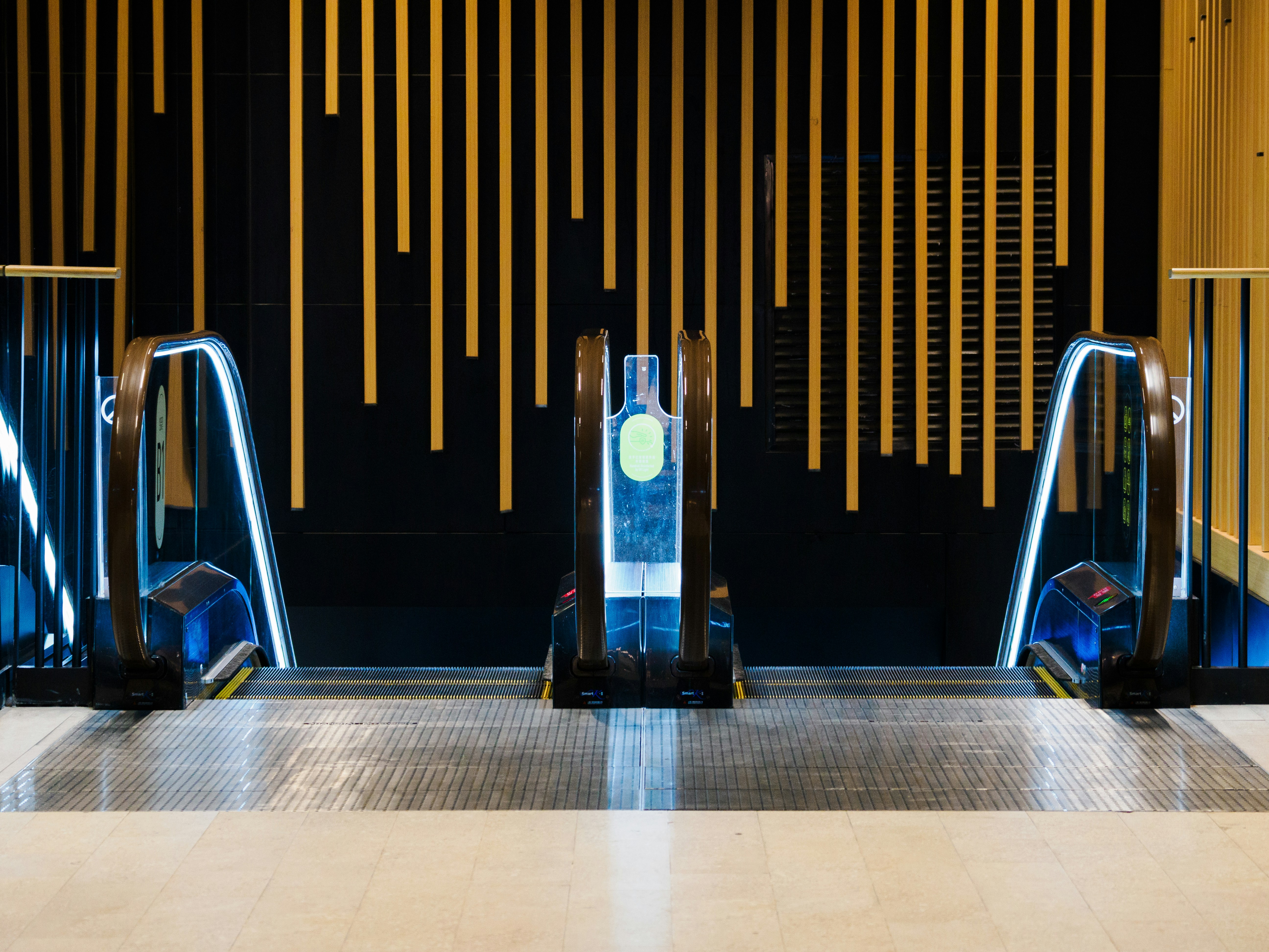 A couple of machines sitting on top of a tiled floor