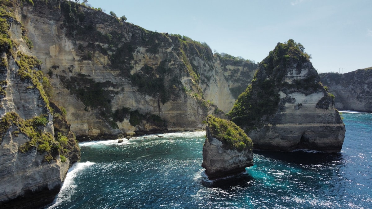 A large body of water surrounded by mountains
