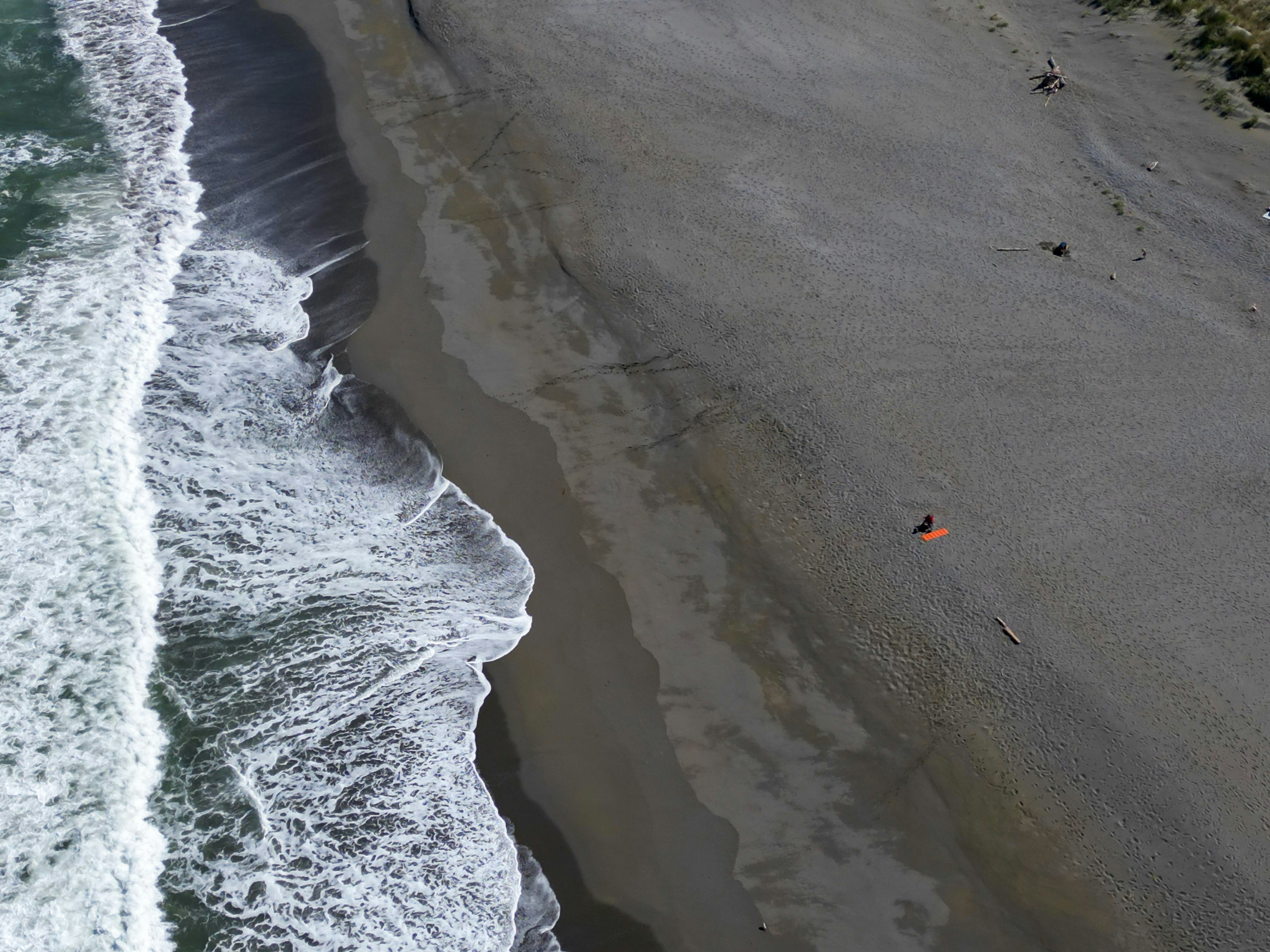 An aerial view of a beach and ocean