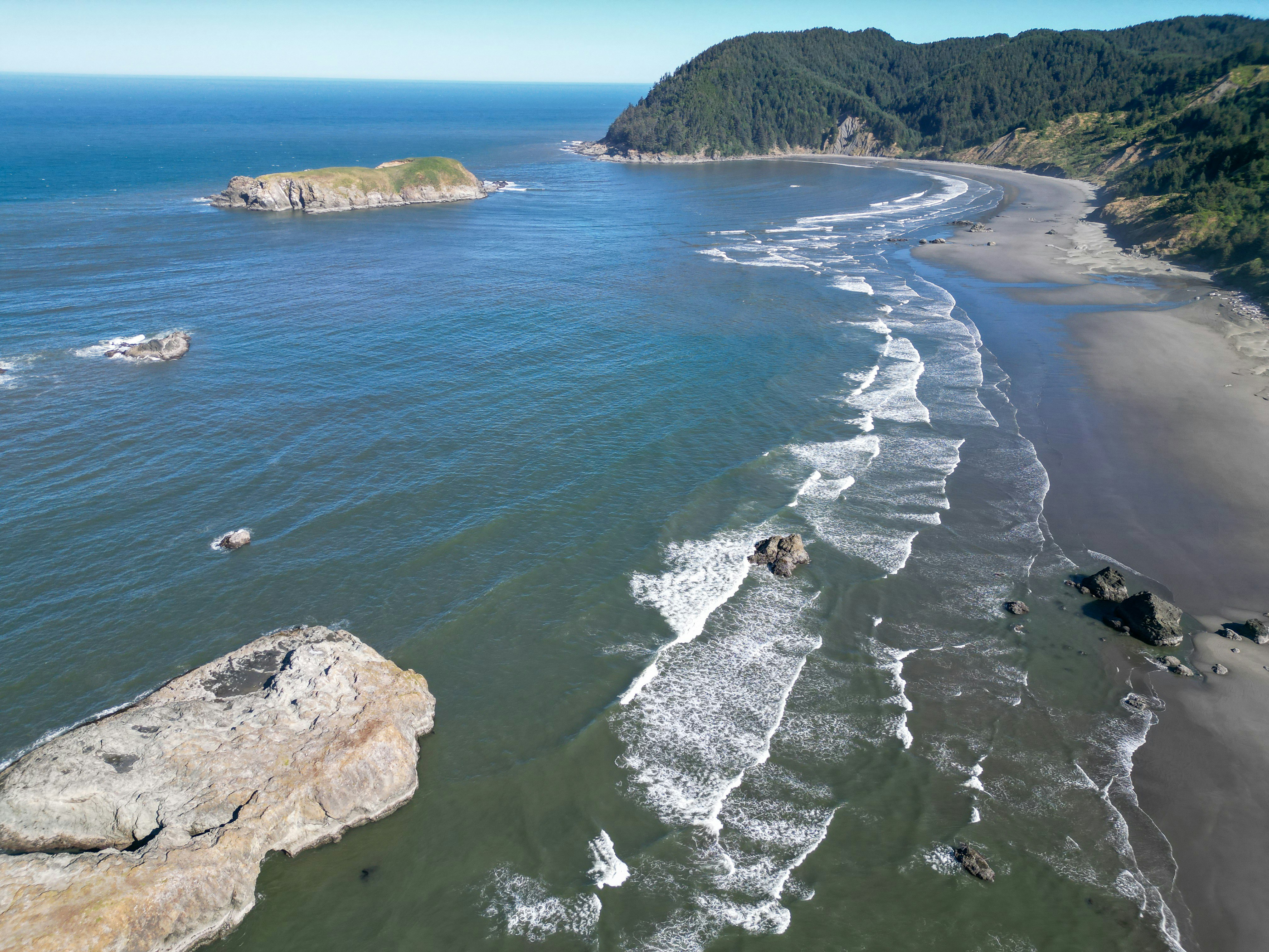 An aerial view of a beach and a body of water