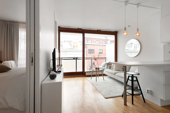 A living room filled with furniture and a flat screen TV