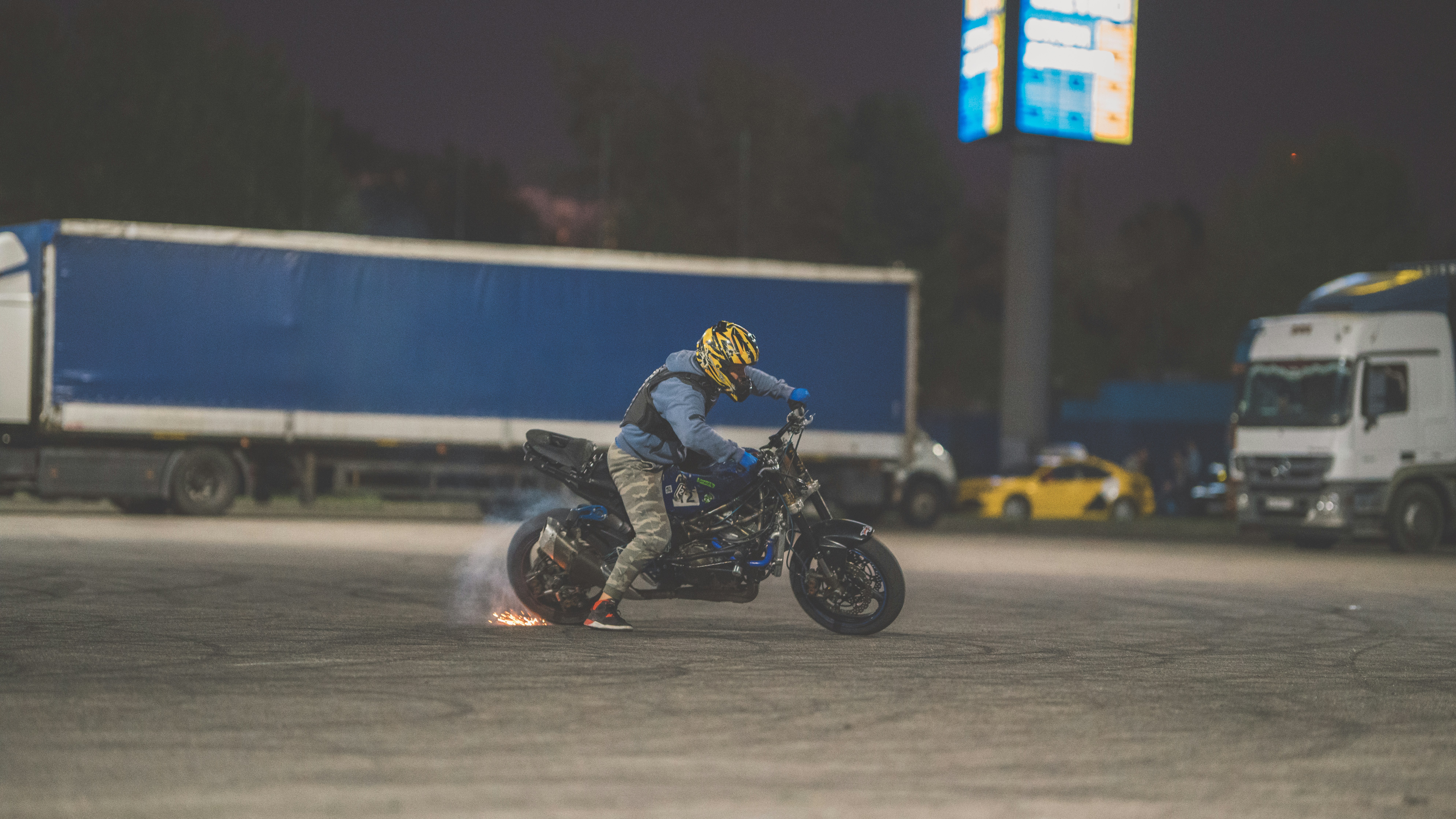 A person riding a motorcycle on a street