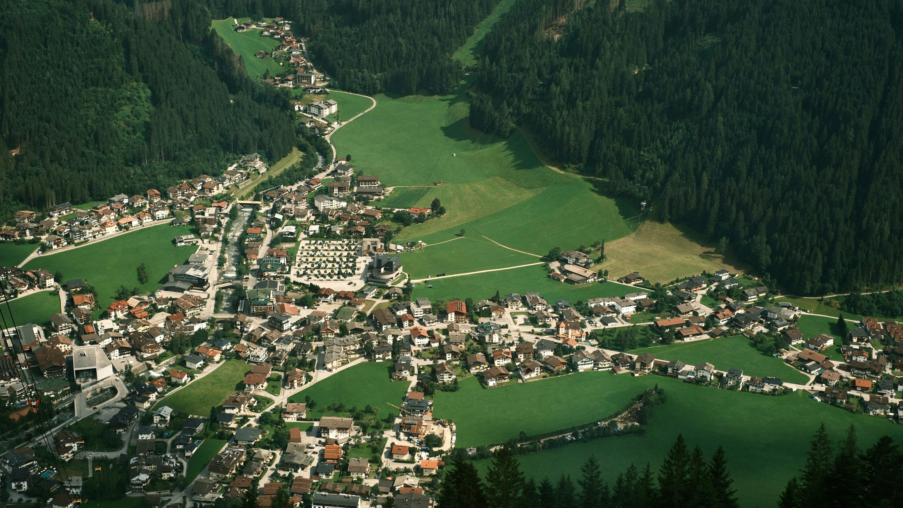 An aerial view of a small town in the mountains
