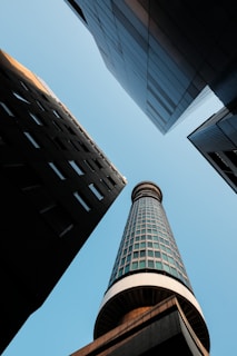 Looking up at a tall building in a city